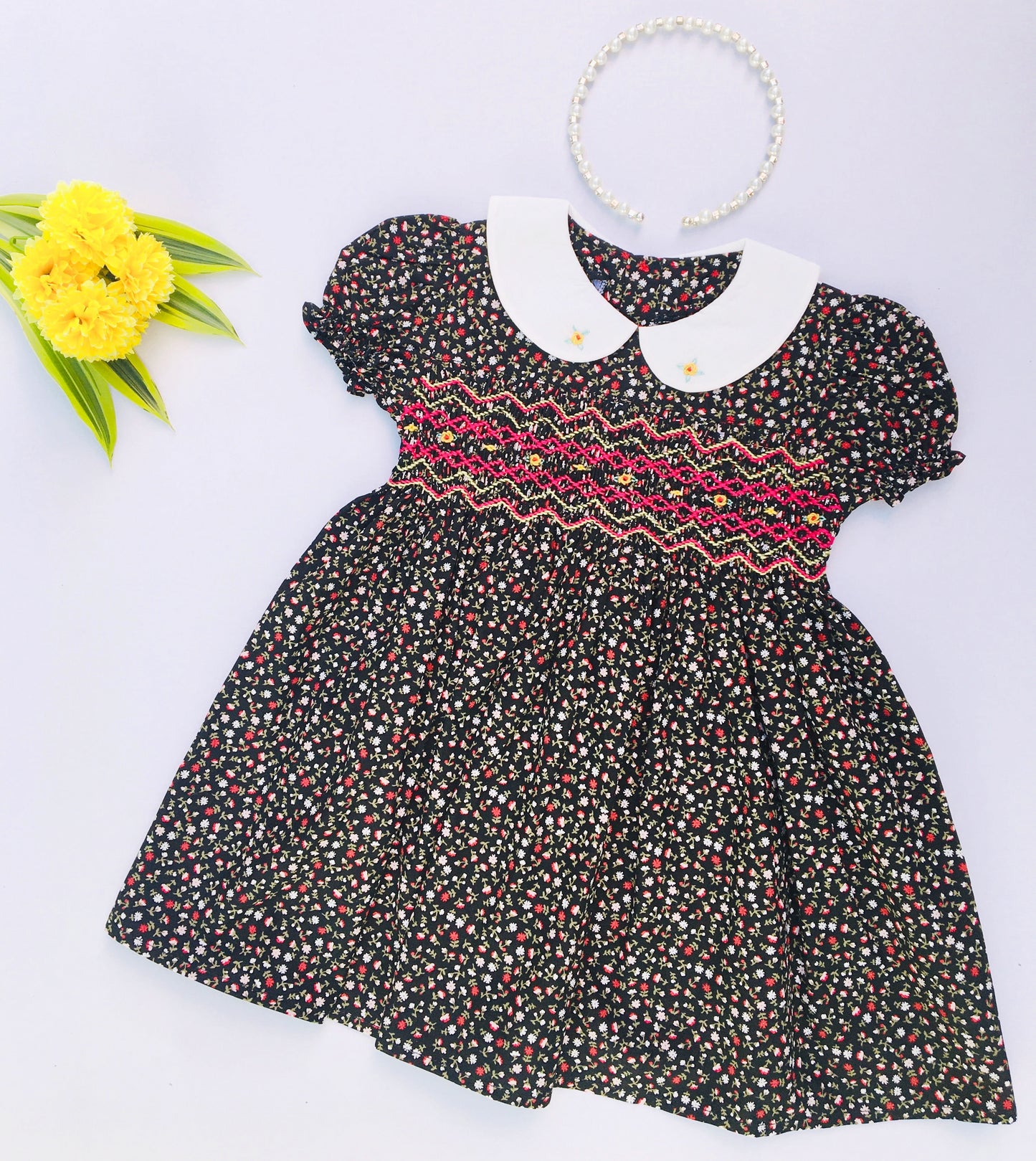 Black Coloured Floral Print Smocked Dress For cute little girls