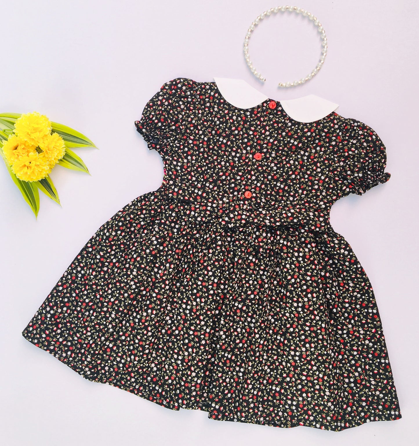 Black Coloured Floral Print Smocked Dress For cute little girls