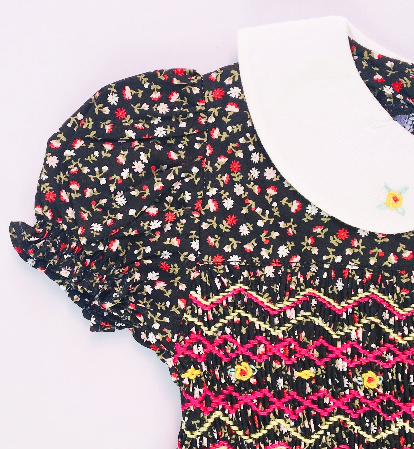 Black Coloured Floral Print Smocked Dress For cute little girls